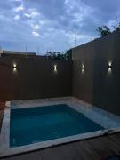 Linda casa a 100 metros da praia!