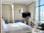 Luxury studio with beach and pool access.