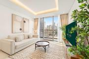 FIRST CLASS 1BR Burj Views , Prime Location