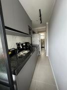 Flat em frente a praia da Guilhermina