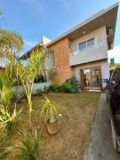 Casa com piscina em local tranquilo