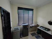 Top Tanah Merah