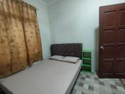 Top Tanah Merah