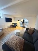 Private basement city apartment with parking