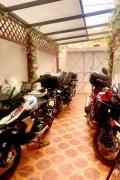 Spacious Apartment with Motorcycle Garage, Free Parking, and Air Conditioning