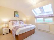 Top Newton by the Sea