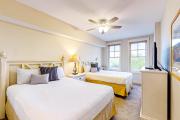 Bright & cozy coastal condo with shared pools hot tubs fast WiFi & central AC