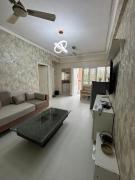 The Golden Mirror A Warm 1BHK with Balcony