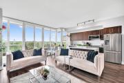 Downtown 2BR plus Den Condo with Lake Views and Parking