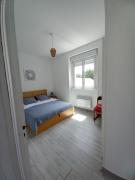 The feet in the sand - and town