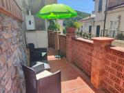 Alloggio con Giardino, Wi-Fi e Aria Condizionata