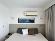 Flat confortável em Imbetiba com piscina e academia