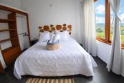 Habitación cama Queen baño privado