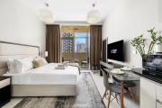 Stylish DAMAC Studio with Balcony & Pool Views in JVC