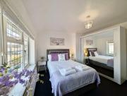 Modern 4-Bedroom Flat in RM9 Ideal for Groups