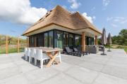 Luxe 8 persoons Welness Villa Nova in het Duingebied tussen Nes en het Strand