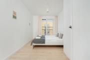 Jasny Apartament z 2 sypialniami i Balkonem by Noclegi Renters