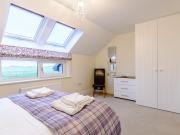 Top Newton by the Sea