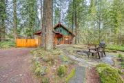 Historic riverfront Steiner cabin in forest with firepit deck & patio lounging