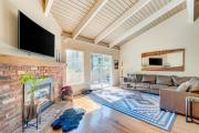 Two-story mountain-view condo with balcony fireplace & pool - dog-friendly