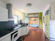 STUDIO CLIMATISE avec MEZZANINE au calme avec terrasse et parking idéalement situé pour tout faire à pied !