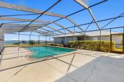Lake‑front 4BR home with pool, outdoor kitchen & serene Florida getaway