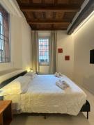 Sotto le Torri by Edera Rooms