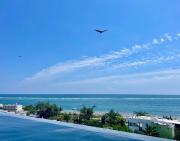 Stunning New Apartment, steps from the beach