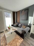 Hafenglück - moderne Ferienwohnung direkt am Hafen in Carolinensiel