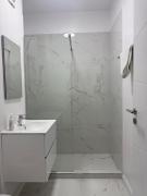 Sandy studio Exigent Plaza