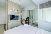 Fully Furnished with Comfy Design Studio Grand Kamala Lagoon Apartment By Travelio