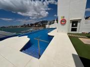 Apartamento Frente a la Playa con Piscina y Terraza en Puerto Marina