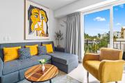 Bright coastal condo with pool access, private balcony & fast Wi-Fi