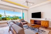 Luxurious 1st-floor condo with pool, oceanfront balcony & water view