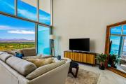 Luxury ocean-view condo with resort pool, private balcony, and washerdryer