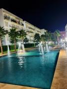 Spacious 2BR Apartment with Stunning Pool View & Secure Access