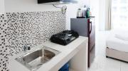Homey and Comfy Studio at Puncak Bukit Golf Surabaya Apartment By Travelio