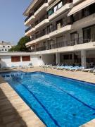 Sunny apartment with pool