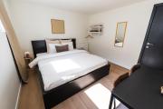 Private Rooms in Shared 7BR Aprt, with WiFi near City Center