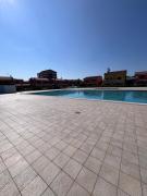 Appartamento Le Spighe mare e piscina