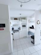 Maison avec jardin dans résidence fermée