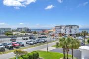 Sun of a Beach by Oak Island Accommodations