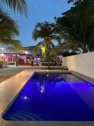 Habitaciones Playa Surf City Aire WiFi y Parqueo