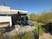 EuroParcs Bad Meersee Chalet Küstenzeit mit Zaun Haus Nr 97