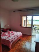 Beautiful room with bathroom first row to the sea with separate shared kitchen - Nin