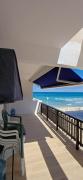 Cosy flat with a large terrace facing the sea