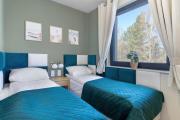 Przytulny Apartament z Ogrodem i Parkingiem by Noclegi Renters