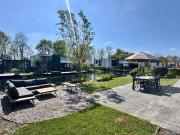 EuroParcs Bad Hoophuizen Chalet Glücksort mit Zaun Haus Nr Water03