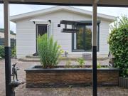 Happy Place is een modern en comfortabel chalet met een grote afgesloten tuin op de Veluwe, Recreatiepark De oude Driest
