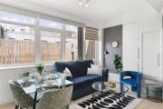 Elegant City Stay 2BR with Ensuite & Dining Area